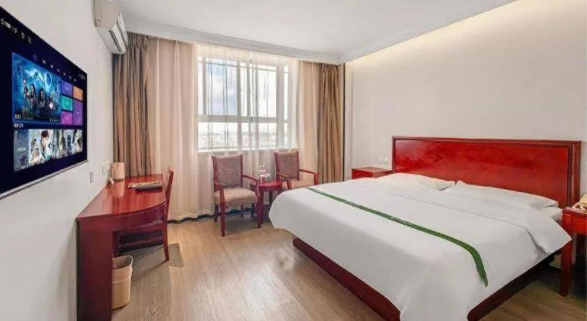 Bed in GreenTree Inn Shanghai Changxing Island Yuansha Fishing Port Hotel