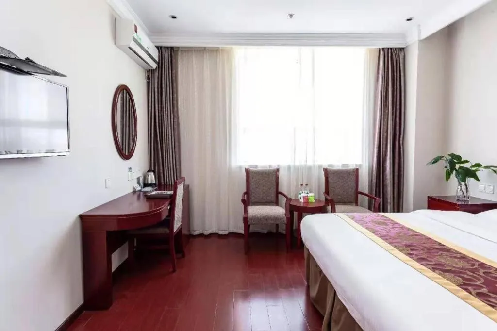 Bed in GreenTree Inn Shanghai Changxing Island Yuansha Fishing Port Hotel