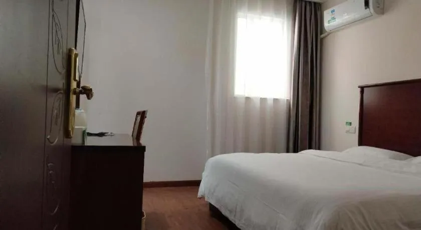 Bed in GreenTree Inn Shanghai Changxing Island Yuansha Fishing Port Hotel