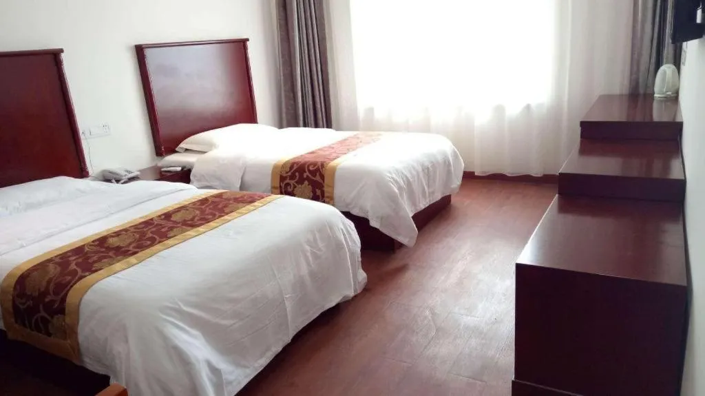 Bed in GreenTree Inn Shanghai Changxing Island Yuansha Fishing Port Hotel