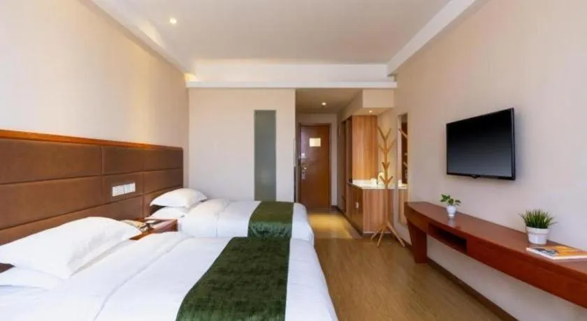 Bed in GreenTree Inn Shanghai Caohejing Development Zone Songjiang Park Jiuxin Road Business Hotel