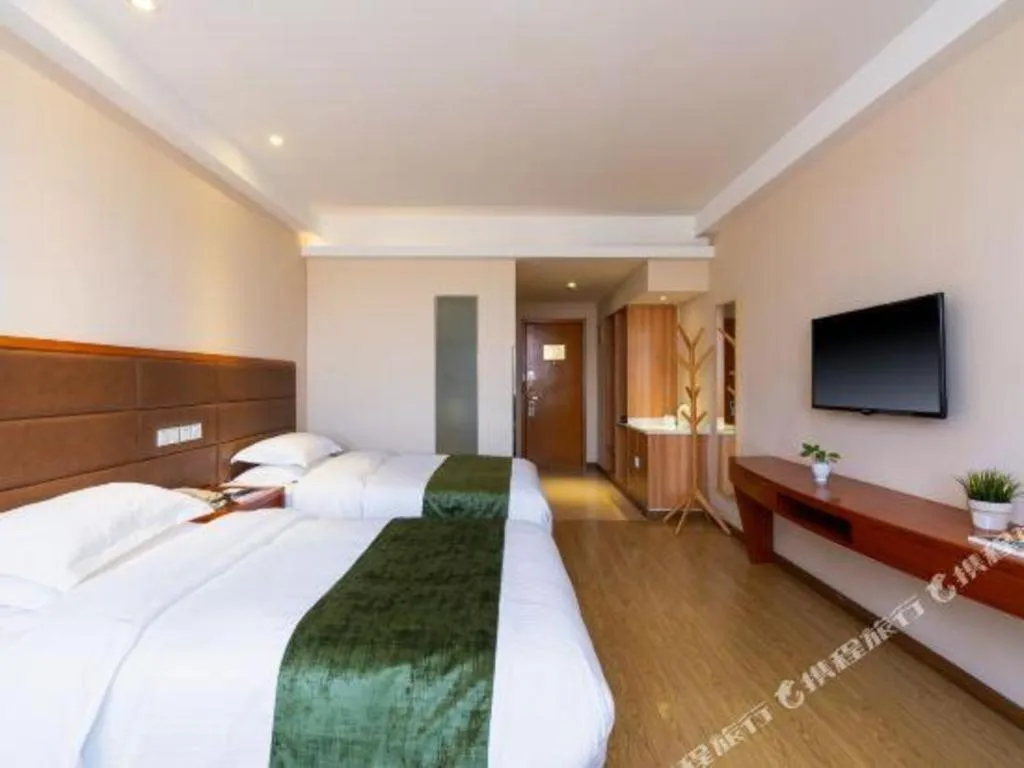Bed in GreenTree Inn Shanghai Caohejing Development Zone Songjiang Park Jiuxin Road Business Hotel