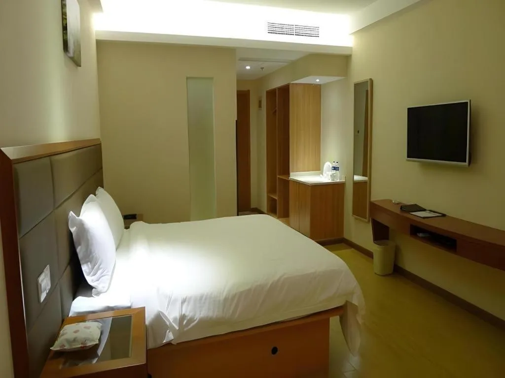 Bed in GreenTree Inn Shanghai Caohejing Development Zone Songjiang Park Jiuxin Road Business Hotel