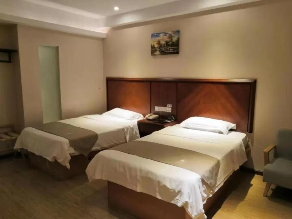 Bed in GreenTree Inn Shanghai Caohejing Development Zone Songjiang Park Jiuxin Road Business Hotel