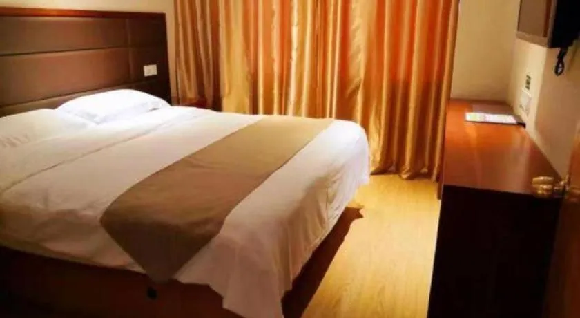 Bed in GreenTree Inn Shanghai Caohejing Development Zone Songjiang Park Jiuxin Road Business Hotel