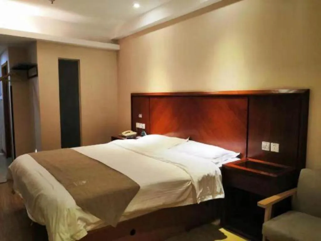 Bed in GreenTree Inn Shanghai Caohejing Development Zone Songjiang Park Jiuxin Road Business Hotel