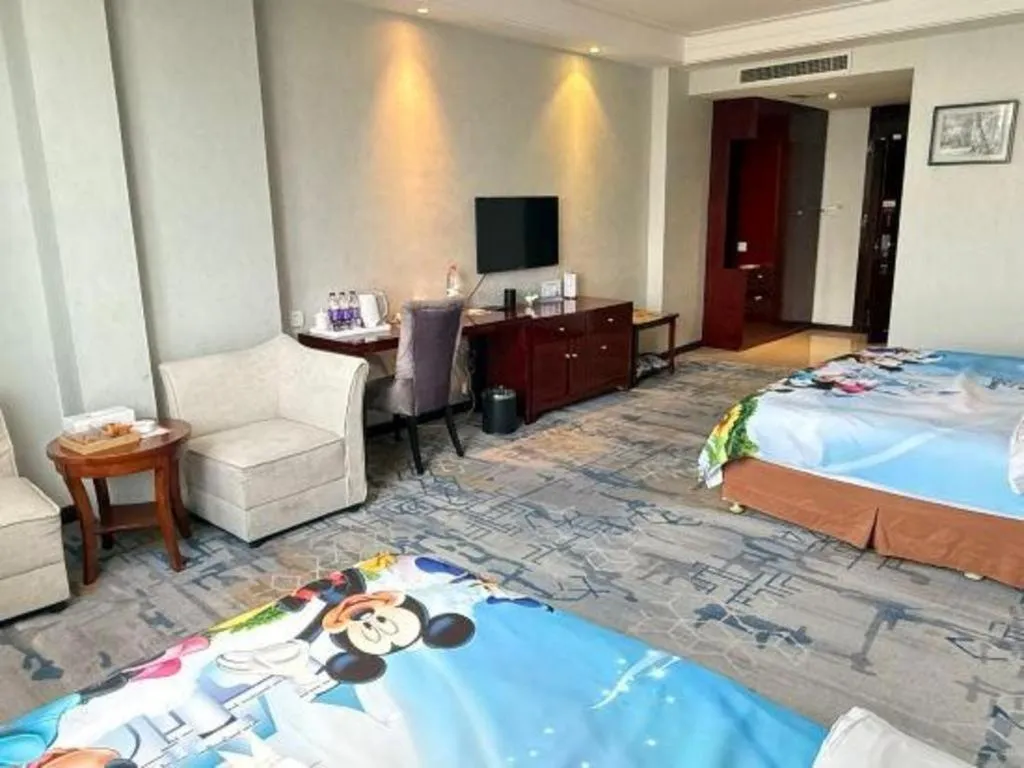 Bed in Xinxiang Zhongzhou Yihe Hotel