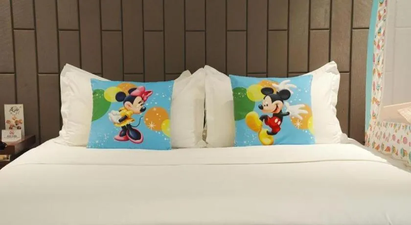 Bed in Jiyuan Oriental Jianguo Hotel