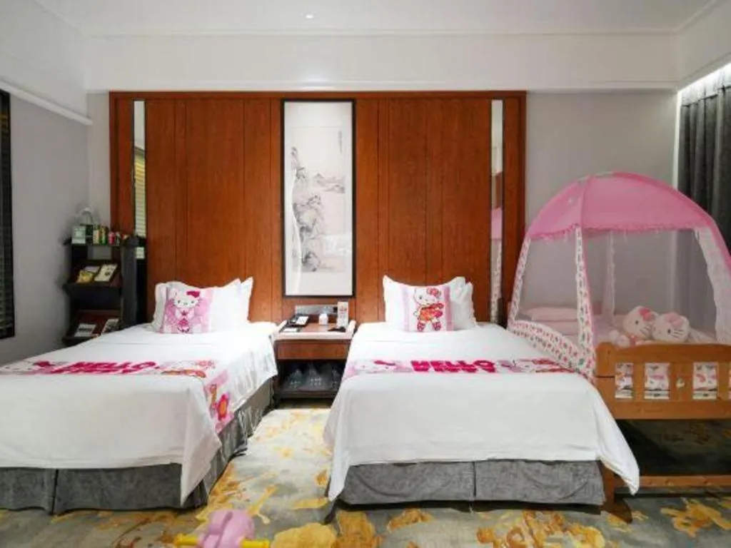 Bed in Jiyuan Oriental Jianguo Hotel