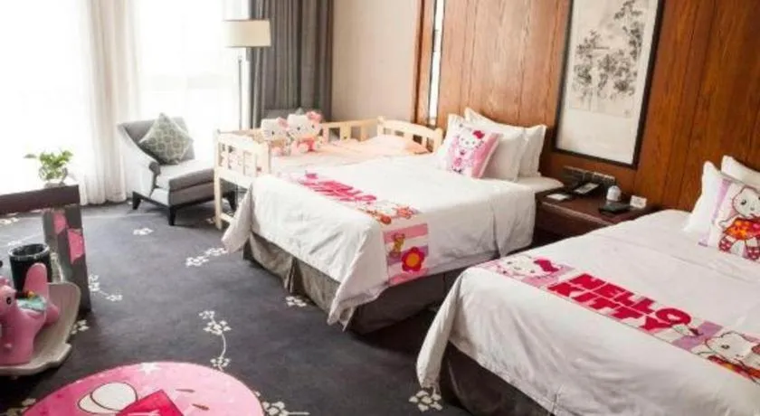 Bed in Jiyuan Oriental Jianguo Hotel