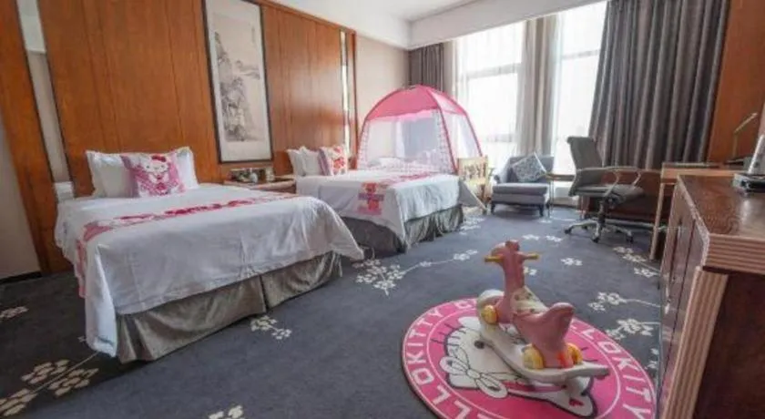 Bed in Jiyuan Oriental Jianguo Hotel