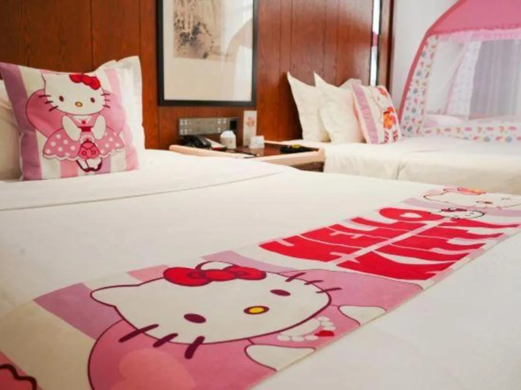 Bed in Jiyuan Oriental Jianguo Hotel