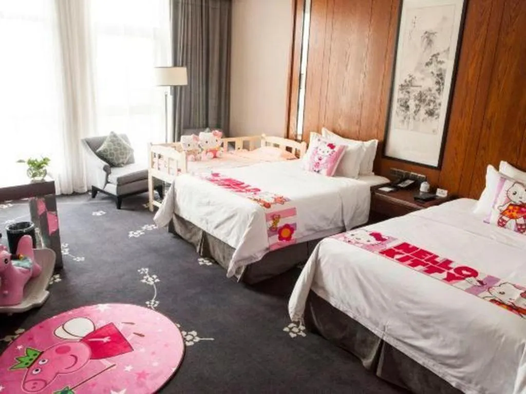 Bed in Jiyuan Oriental Jianguo Hotel