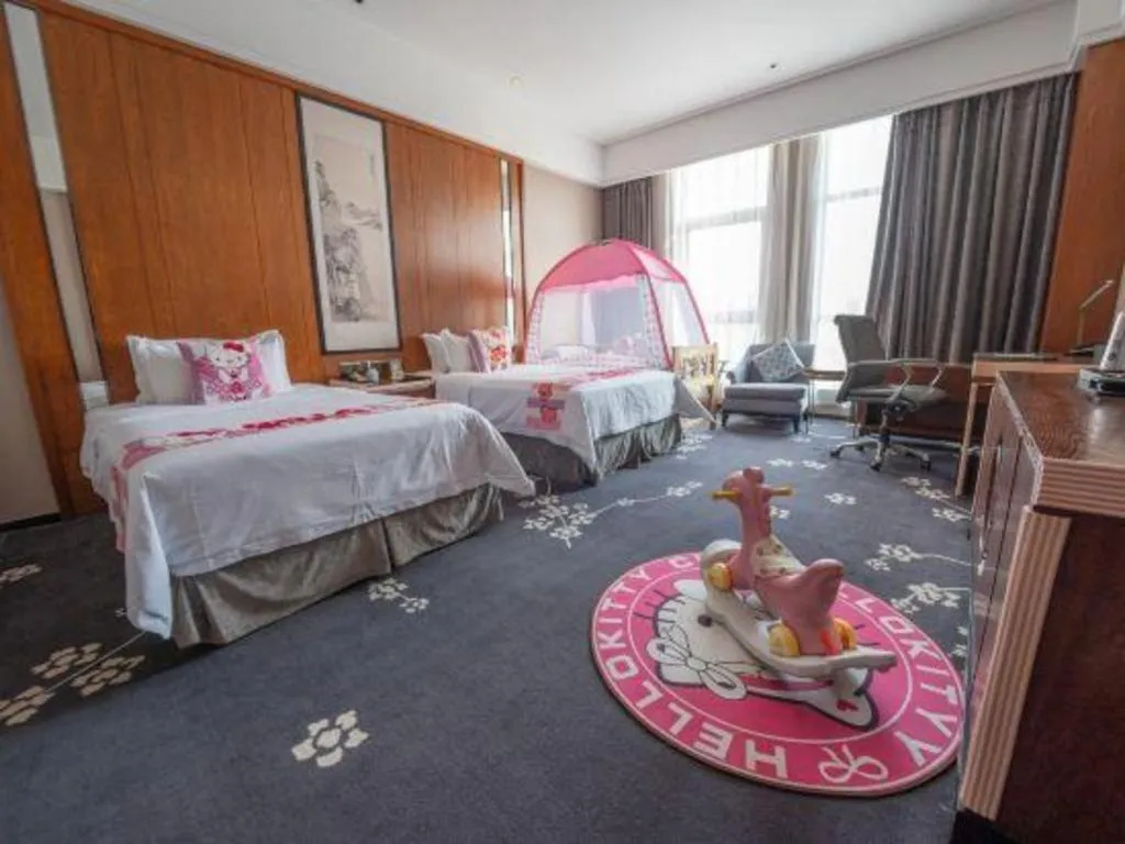 Bed in Jiyuan Oriental Jianguo Hotel