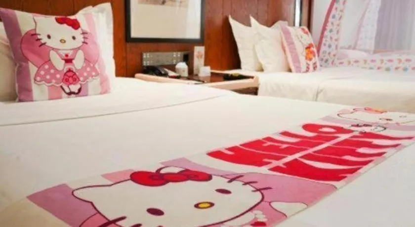 Bed in Jiyuan Oriental Jianguo Hotel