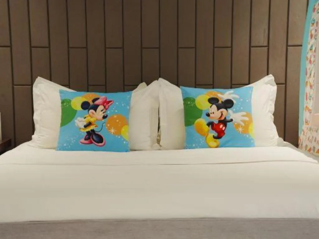 Bed in Jiyuan Oriental Jianguo Hotel