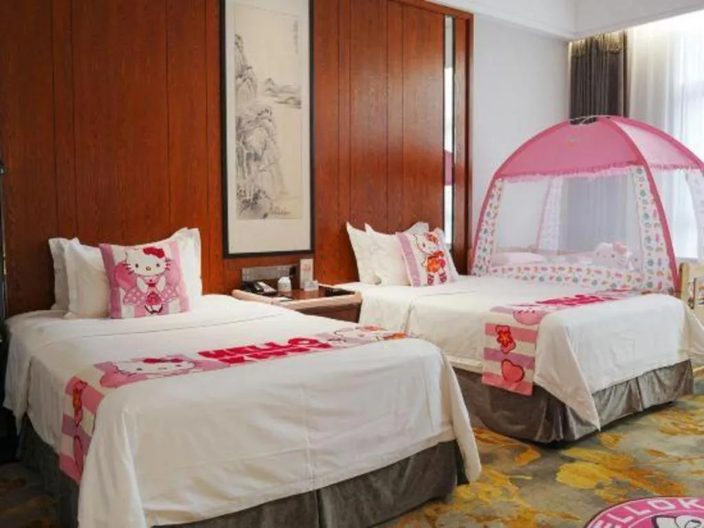 Bed in Jiyuan Oriental Jianguo Hotel