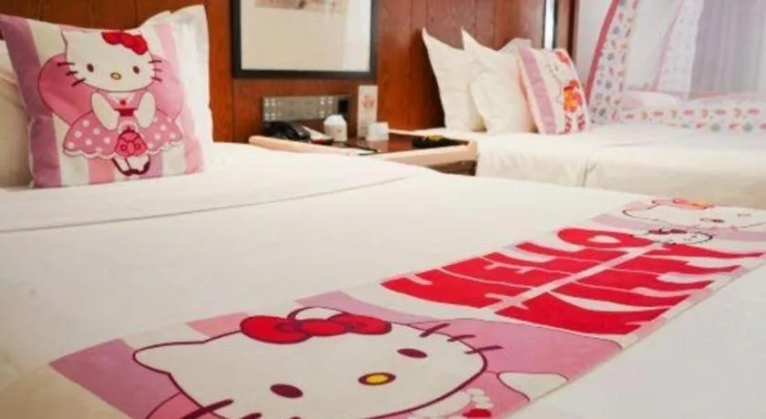 Bed in Jiyuan Oriental Jianguo Hotel