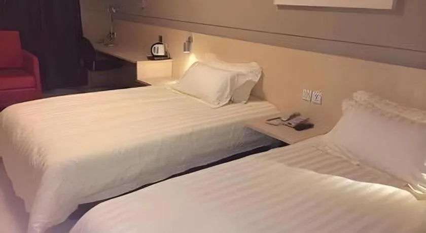 Bed in Jinjiang Inn Tai Zhou Xinghua Yingwu Bridge Branch