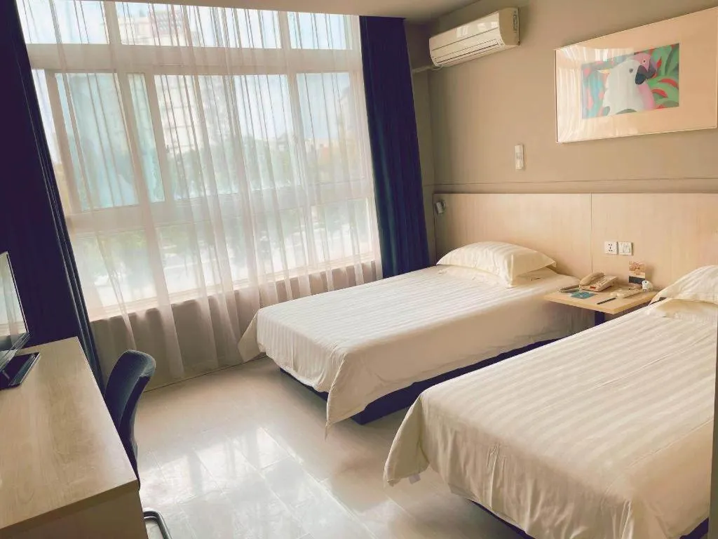 Bed in Jinjiang Inn Tai Zhou Xinghua Yingwu Bridge Branch