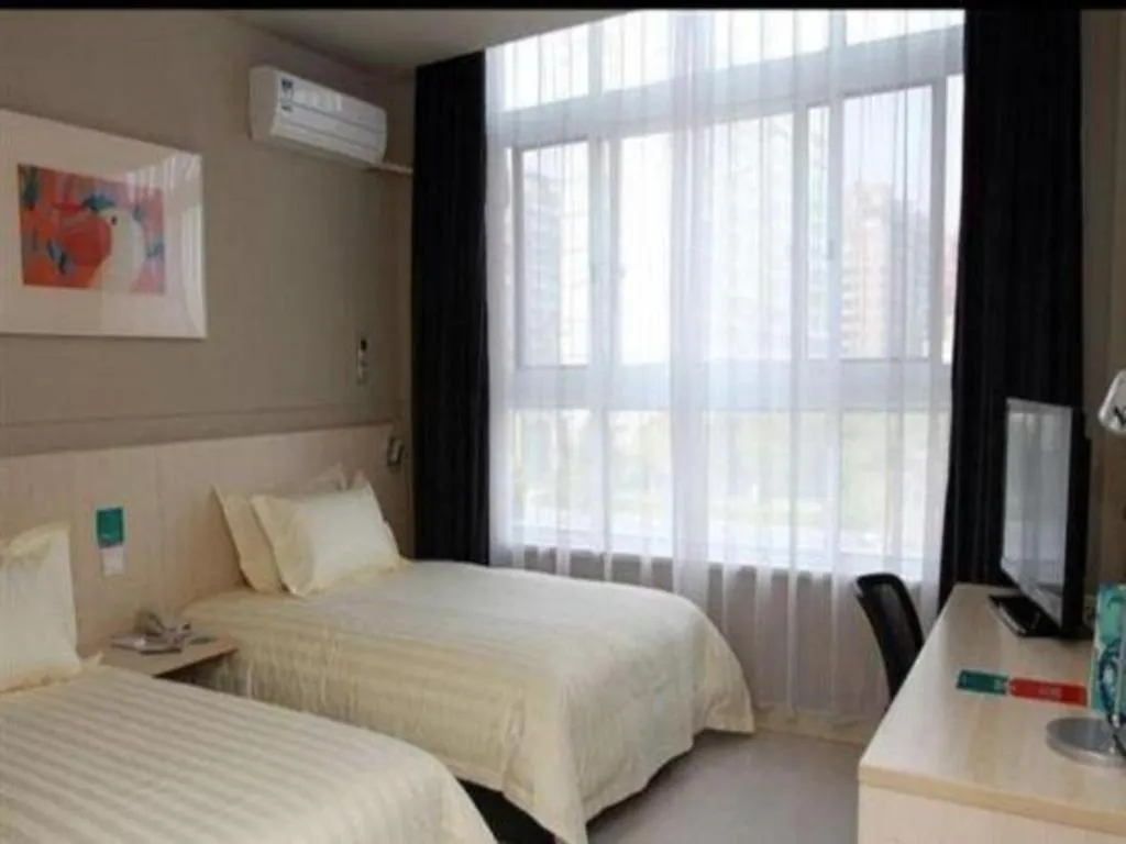 Bed in Jinjiang Inn Tai Zhou Xinghua Yingwu Bridge Branch