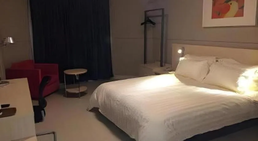 Bed in Jinjiang Inn Tai Zhou Xinghua Yingwu Bridge Branch