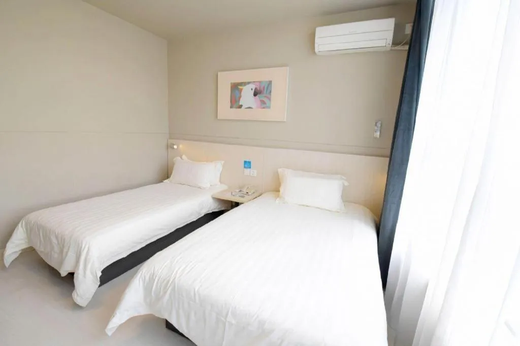 Bed in Jinjiang Inn Tai Zhou Xinghua Yingwu Bridge Branch