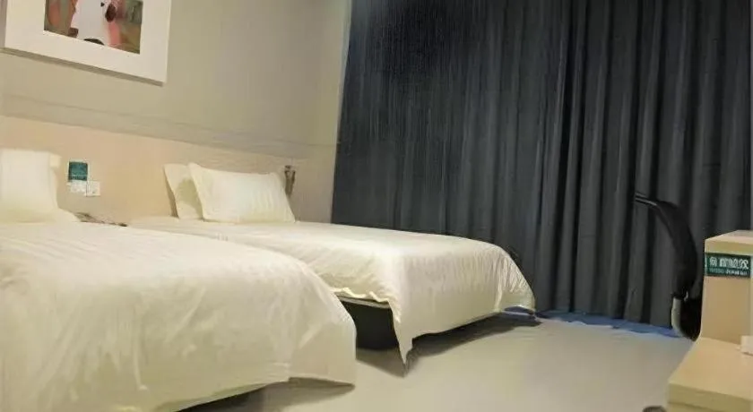 Bed in Jinjiang Inn Tai Zhou Xinghua Yingwu Bridge Branch