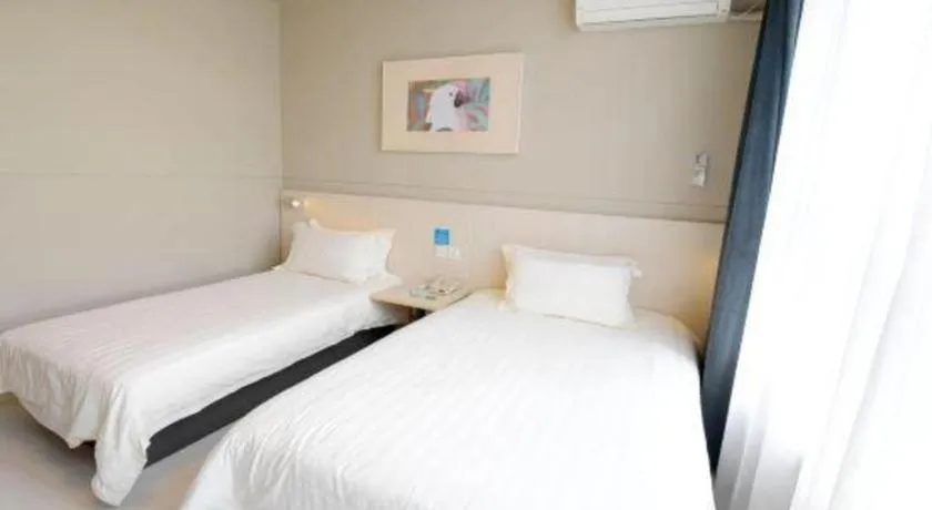 Bed in Jinjiang Inn Tai Zhou Xinghua Yingwu Bridge Branch