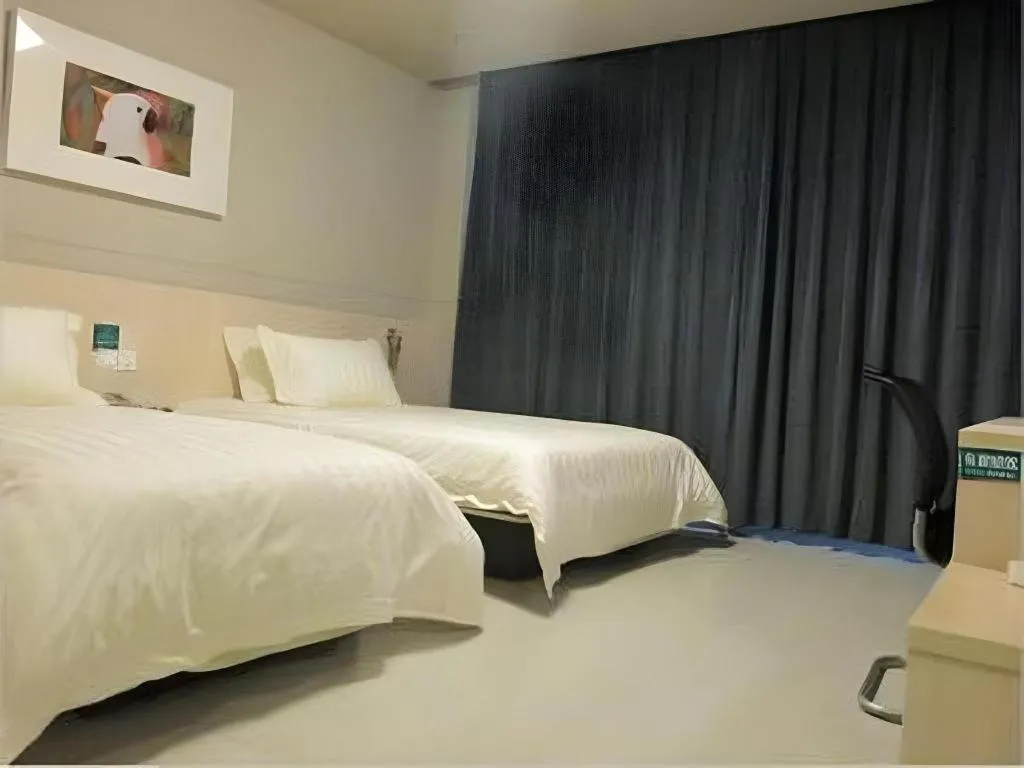 Bed in Jinjiang Inn Tai Zhou Xinghua Yingwu Bridge Branch