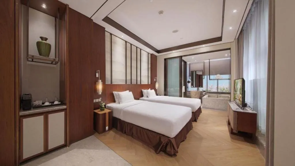 Bed in Fliport Hotel Zhangzhou Yuanshan