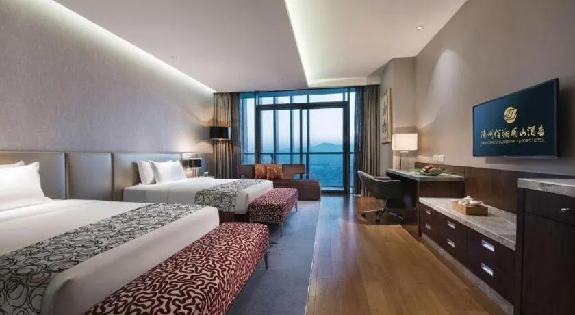 Bed in Fliport Hotel Zhangzhou Yuanshan