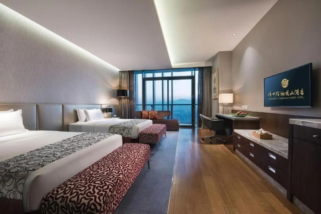 Bed in Fliport Hotel Zhangzhou Yuanshan