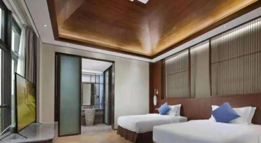 Bed in Fliport Hotel Zhangzhou Yuanshan