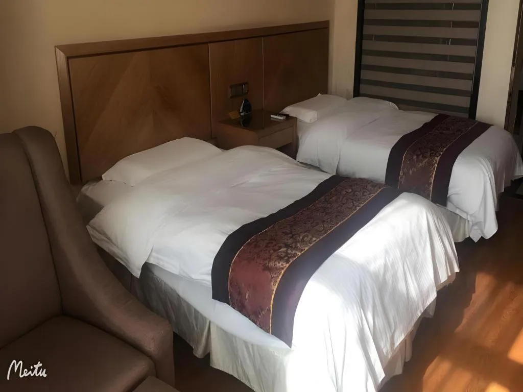 Bed in GreenTree Inn Jiangsu Wuxi Huishan High-Speed Rail Qianzhou Chongwen Road Business Hotel