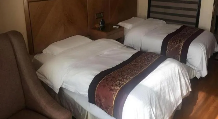 Bed in GreenTree Inn Jiangsu Wuxi Huishan High-Speed Rail Qianzhou Chongwen Road Business Hotel