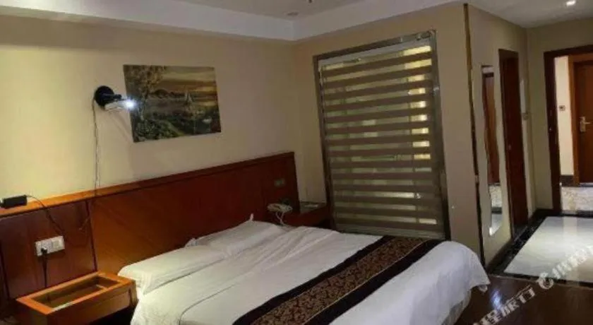 Bed in GreenTree Inn Jiangsu Wuxi Huishan High-Speed Rail Qianzhou Chongwen Road Business Hotel