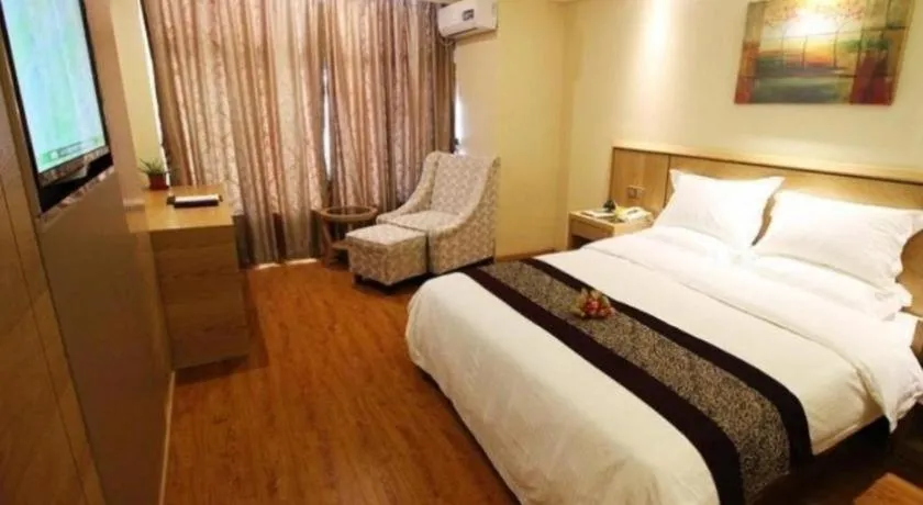 Bed in GreenTree Inn Jiangsu Wuxi Huishan High-Speed Rail Qianzhou Chongwen Road Business Hotel