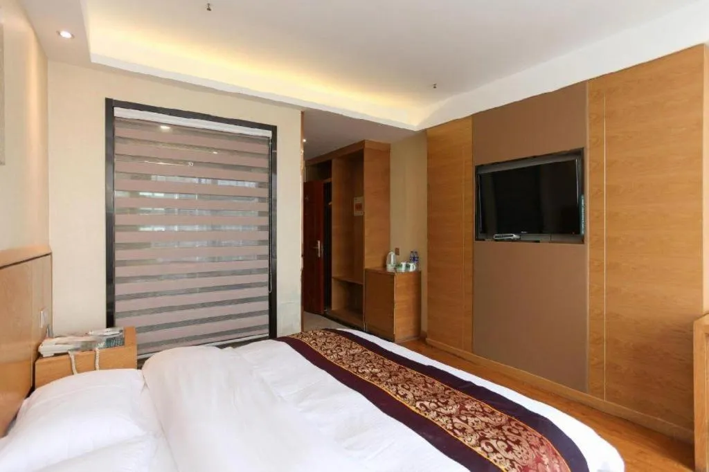 Bed in GreenTree Inn Jiangsu Wuxi Huishan High-Speed Rail Qianzhou Chongwen Road Business Hotel