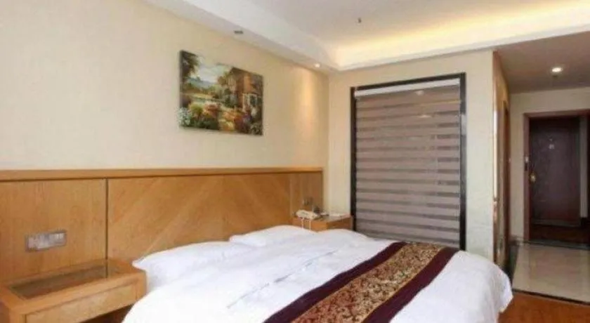 Bed in GreenTree Inn Jiangsu Wuxi Huishan High-Speed Rail Qianzhou Chongwen Road Business Hotel
