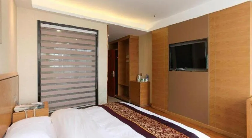 Bed in GreenTree Inn Jiangsu Wuxi Huishan High-Speed Rail Qianzhou Chongwen Road Business Hotel