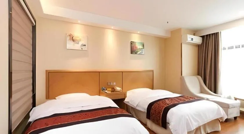 Bed in GreenTree Inn Jiangsu Wuxi Huishan High-Speed Rail Qianzhou Chongwen Road Business Hotel