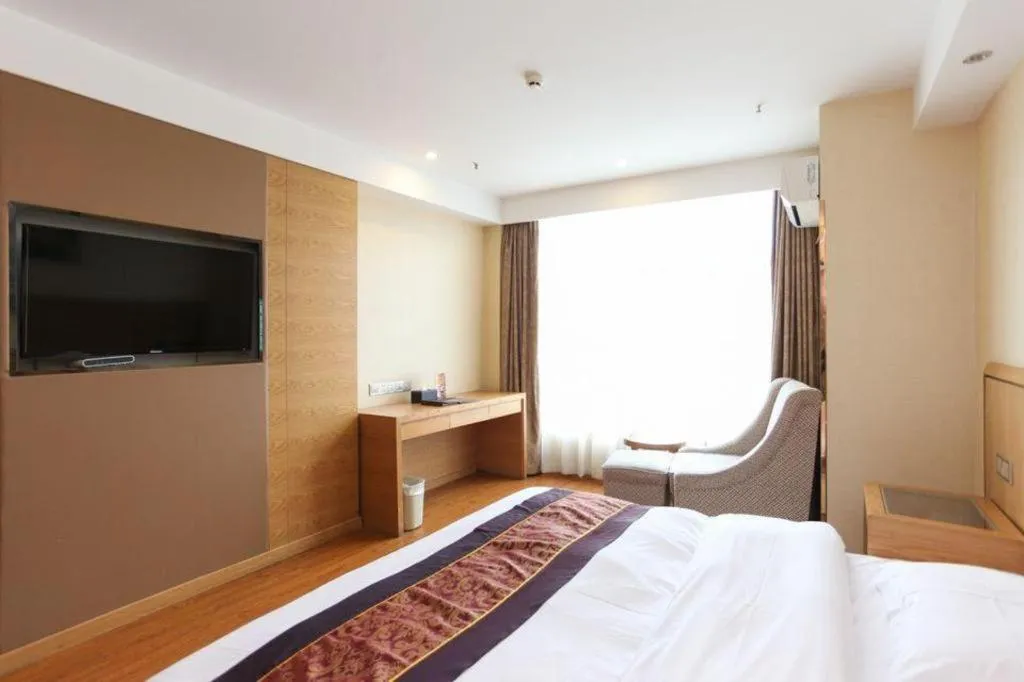 Bed in GreenTree Inn Jiangsu Wuxi Huishan High-Speed Rail Qianzhou Chongwen Road Business Hotel