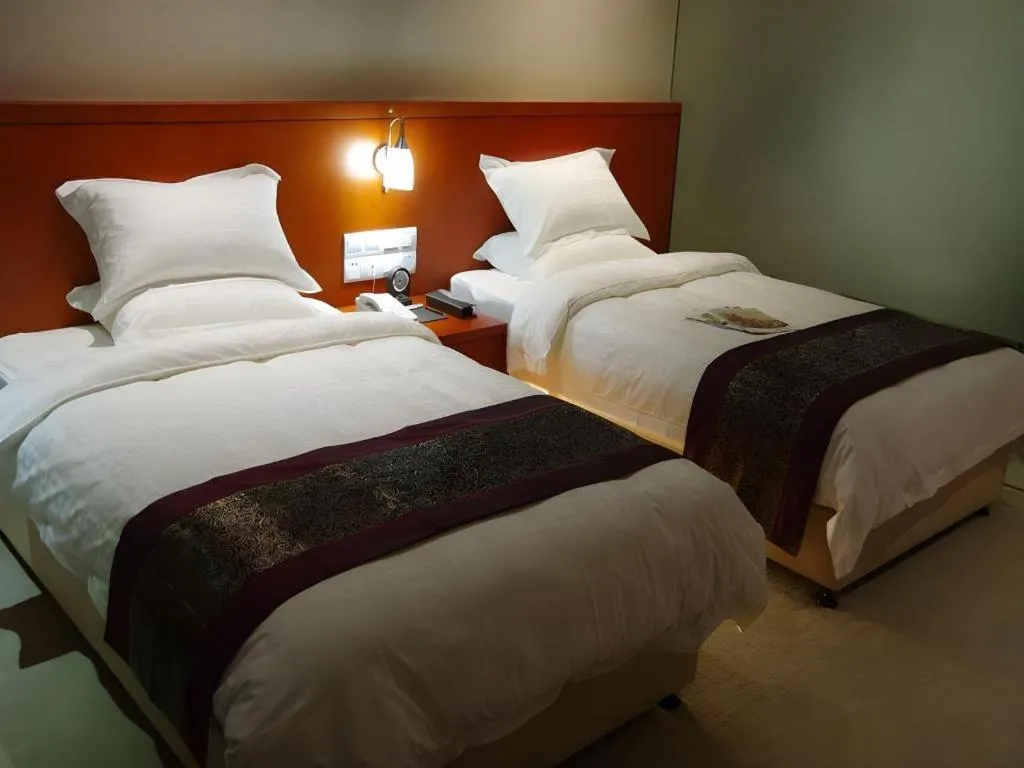 Bed in Sunparkview Hotel Shanghai