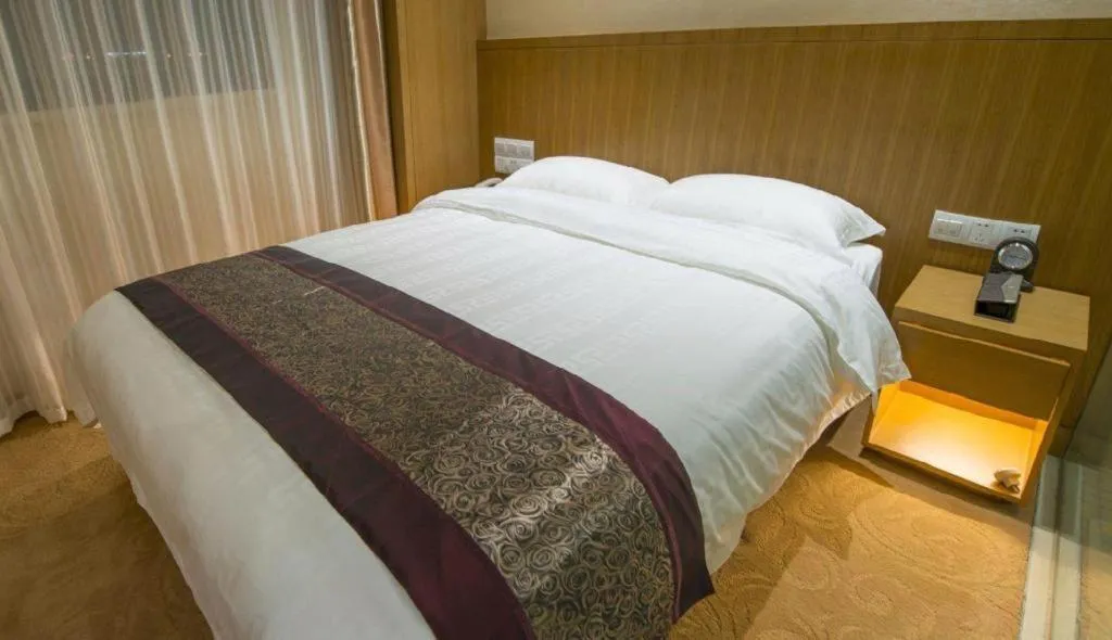 Bed in Sunparkview Hotel Shanghai