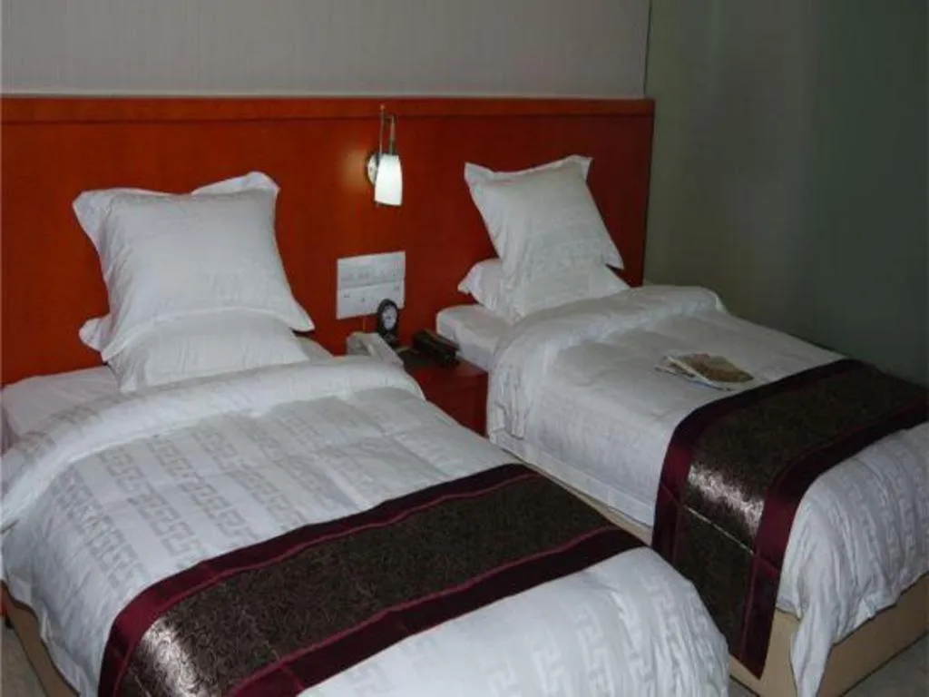 Bed in Sunparkview Hotel Shanghai