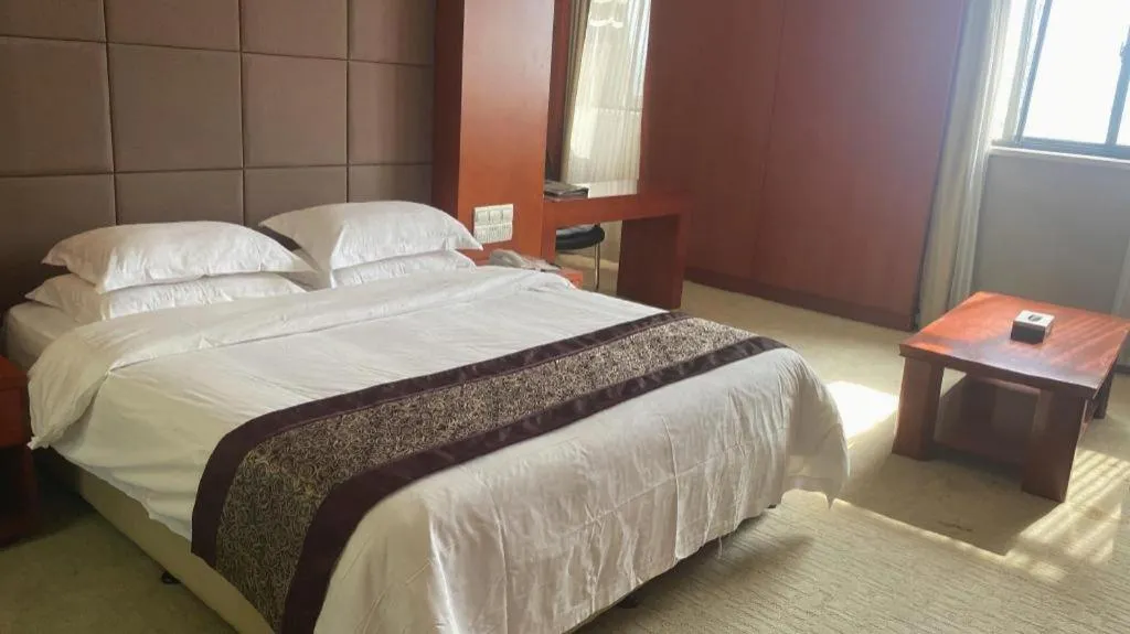 Bed in Sunparkview Hotel Shanghai