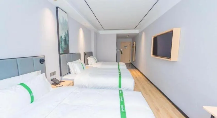 Bed in GreenTree Inn Qingdao Licang Shuyan Road Daweng Square Express Hotel