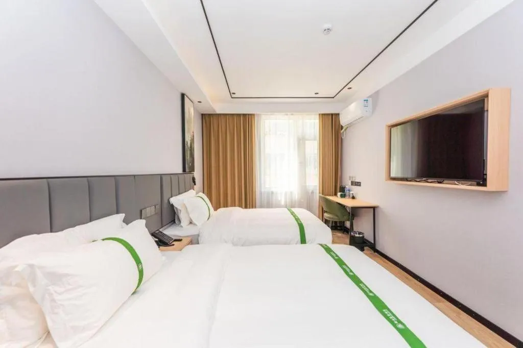 Bed in GreenTree Inn Qingdao Licang Shuyan Road Daweng Square Express Hotel