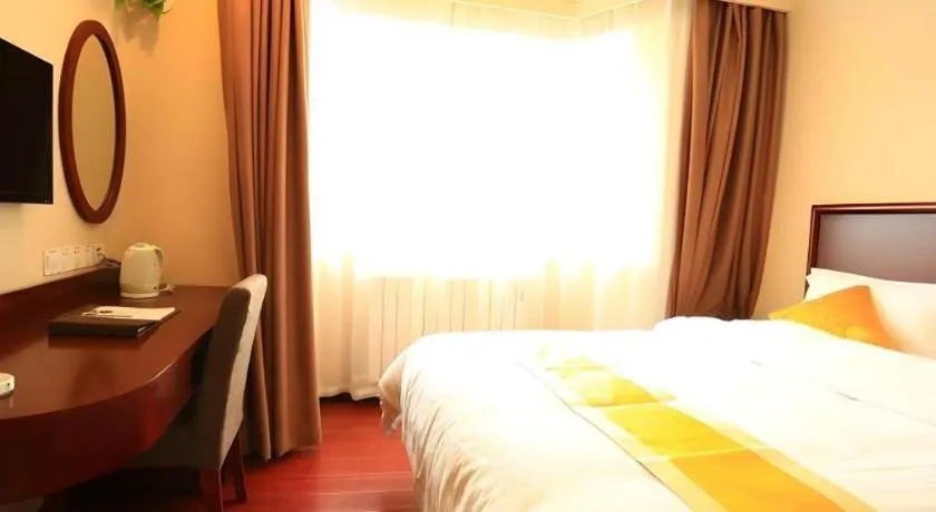 Bed in GreenTree Inn Qingdao Licang Shuyan Road Daweng Square Express Hotel